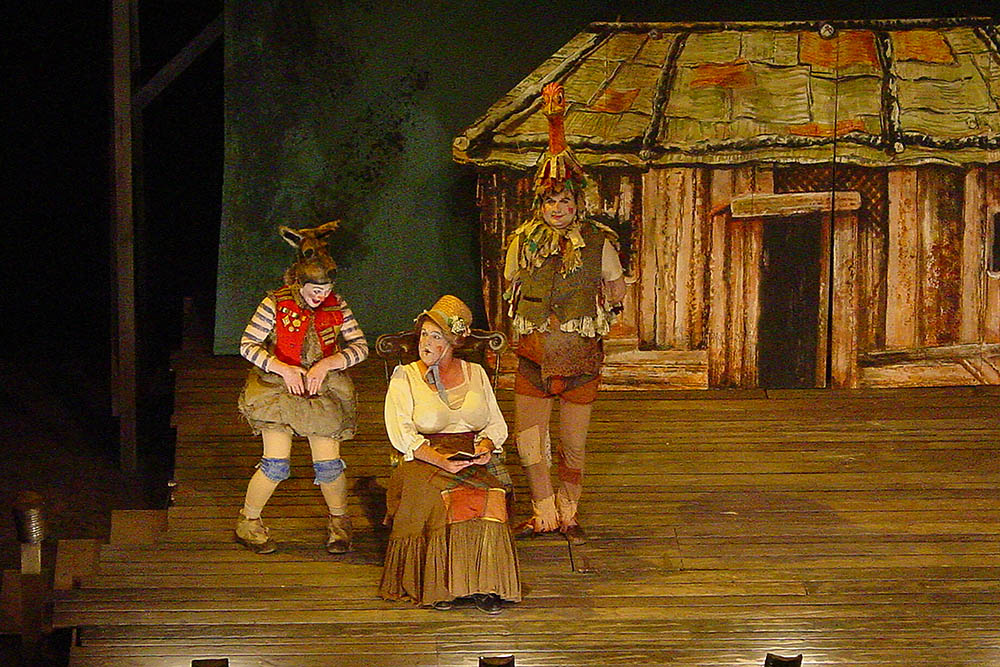 Production still for "Babes in the Wood" (2003). L-R: Julie Forsyth as Boingle, Max Gillies as Aunty Avaricia, Francis Greenslade as Flapgherkin. Photographer: Anna Tregloan
