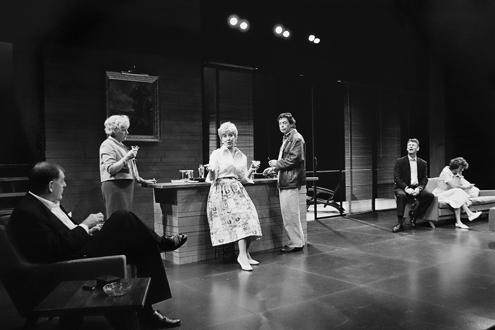 Production still for "The Piccadilly Bushman". L-R: Jon Finlayson as Vincent Franklin, Monica Maughan as Grace Bourne, Julia Blake as Elaine Leggat, Frank Gallacher as Mick O'Shea, John Walton as Alec Ritchie, Rachel Ward as Meg Ritchie. Photographer: Jeff Busby