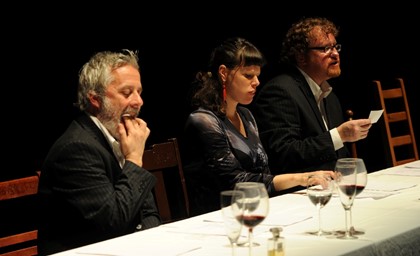 Production still for "The Last Supper". Photographer: Heidrun Lohr
