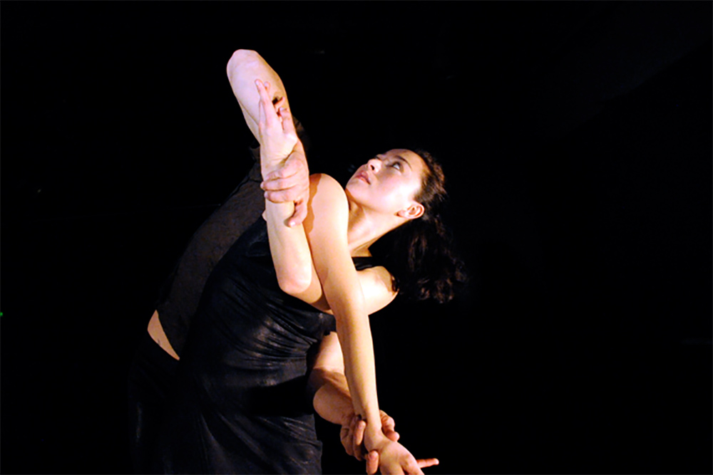 Publicity still for "In Glass". L-R: Kristina Chan, Paul White (obscured). Photographer: Regis Lansac