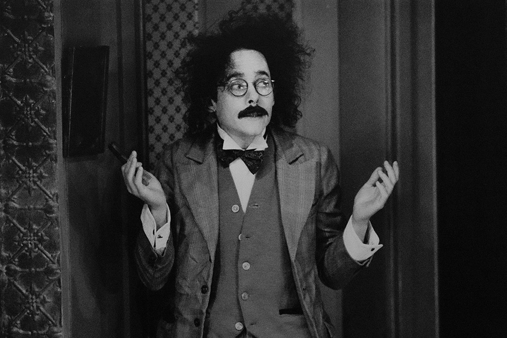  Production still for "Picasso at the Lapin Agile". Tyler Coppin as Einstein. Photographer: Jeff Busby