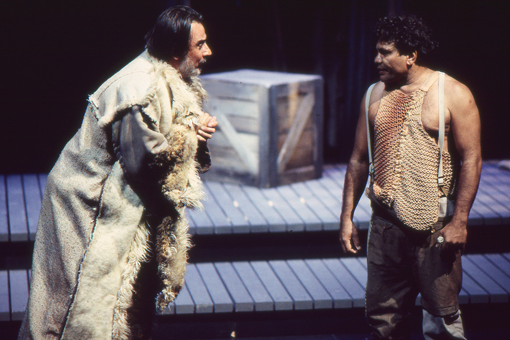 Production still for "The Head of Mary". L-R: Petru Gheorghiu as The Protector, Tom E. Lewis as Yabari. Photographer: Jeff Busby