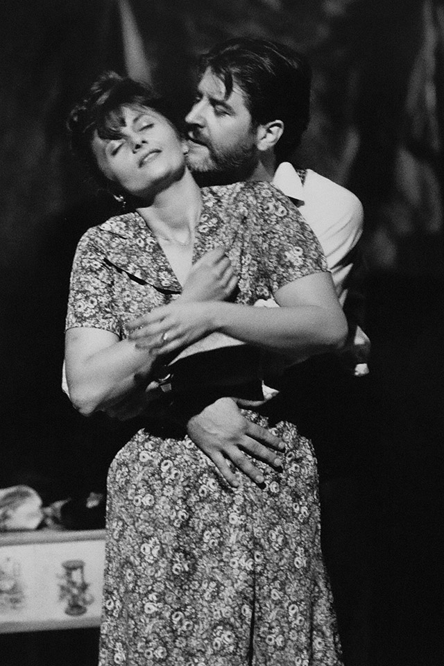 Production still for "Emma: Celebrazione!" L-R: Laura Lattuada as Emma, Robert Forza as Peter. Photographer: Jeff Busby