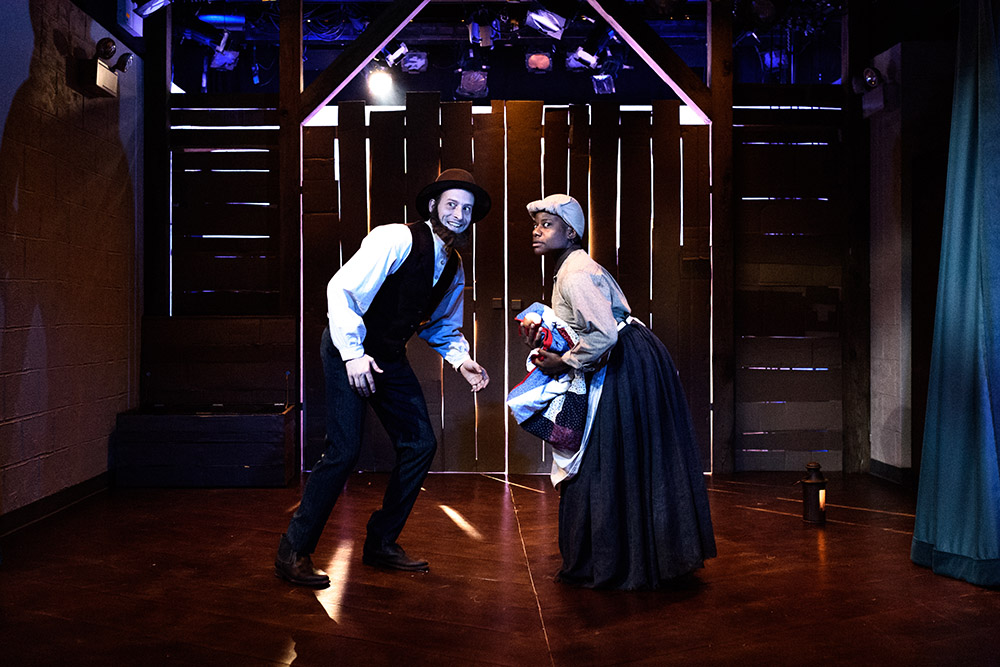 Production still for previous season of "Underground Railroad Game". L-R: Scott R. Sheppard, Jennifer Kidwell. Photographer: Ben Arons