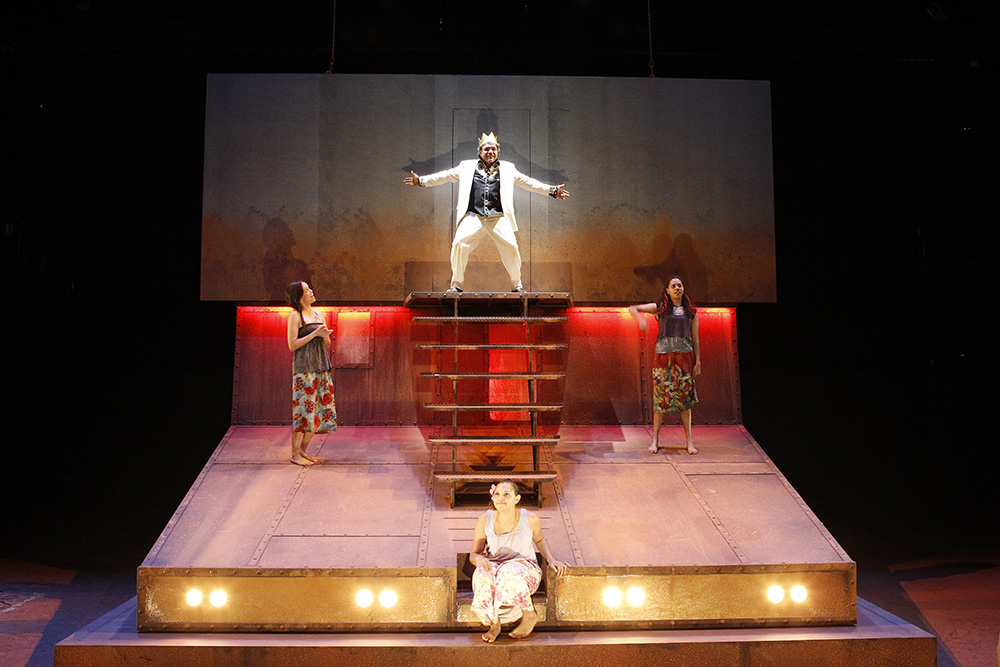 Production still for "The Shadow King". L-R: Jada Alberts, Tom E Lewis (rear), Rarriwuy Hick (front), Natasha Wanganeen. Photographer: Jeff Busby