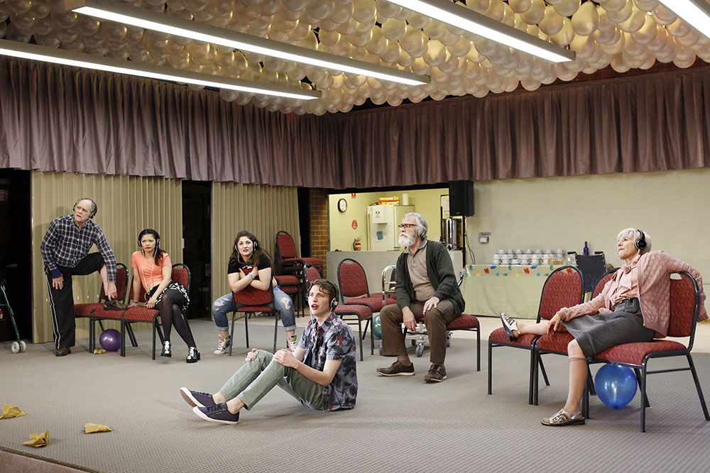 Production still for "Hello, Goodbye and Happy Birthday. L-R: Jim Daly, HaiHa Le, Diana Perini, Matthew Connell, Roger Oakley, Evelyn Krape. Photographer: Jeff Busby