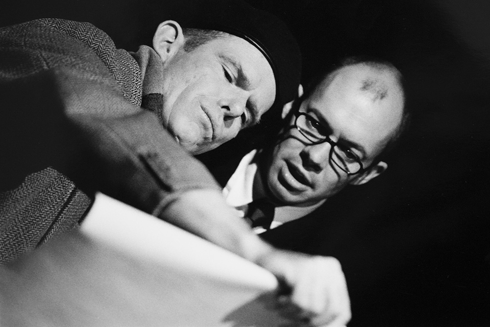 Production still for "Violet Inc". L-R: Ken Radley as Hugh, James Wardlaw as Ivan. Photographer: Jeff Busby